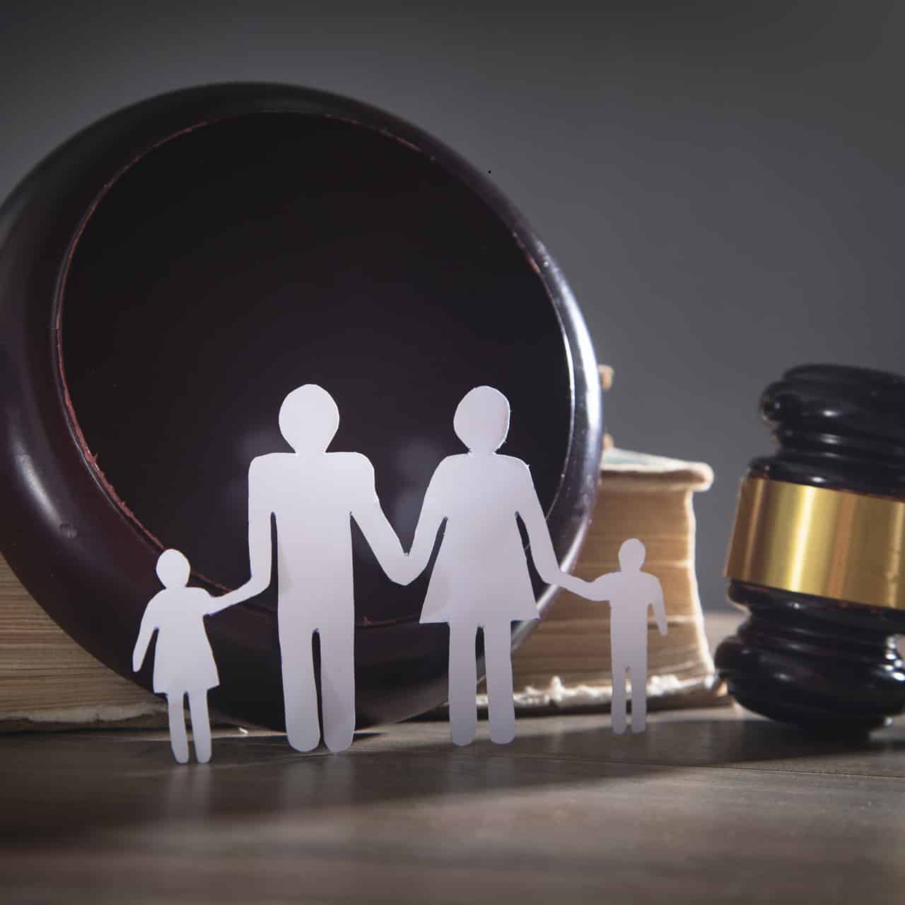Paper cut family, judge gavel and book. Family Law